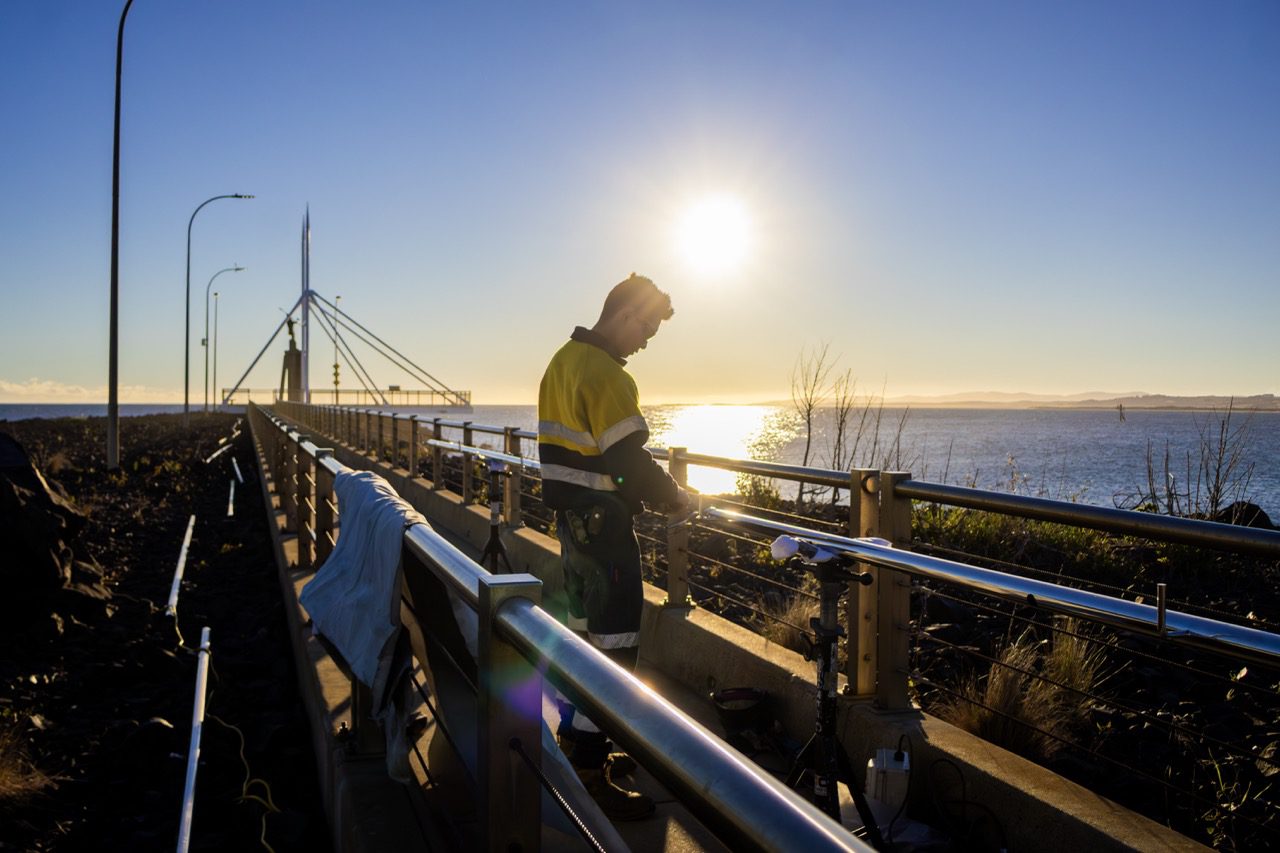 Aiken Head Install 1 copy Large Discover how Degree C transformed Devonport's Aikenhead Point with an innovative coastal lighting solution, combining integrated LED handrail lighting, custom fabrication and sustainable electrical design.