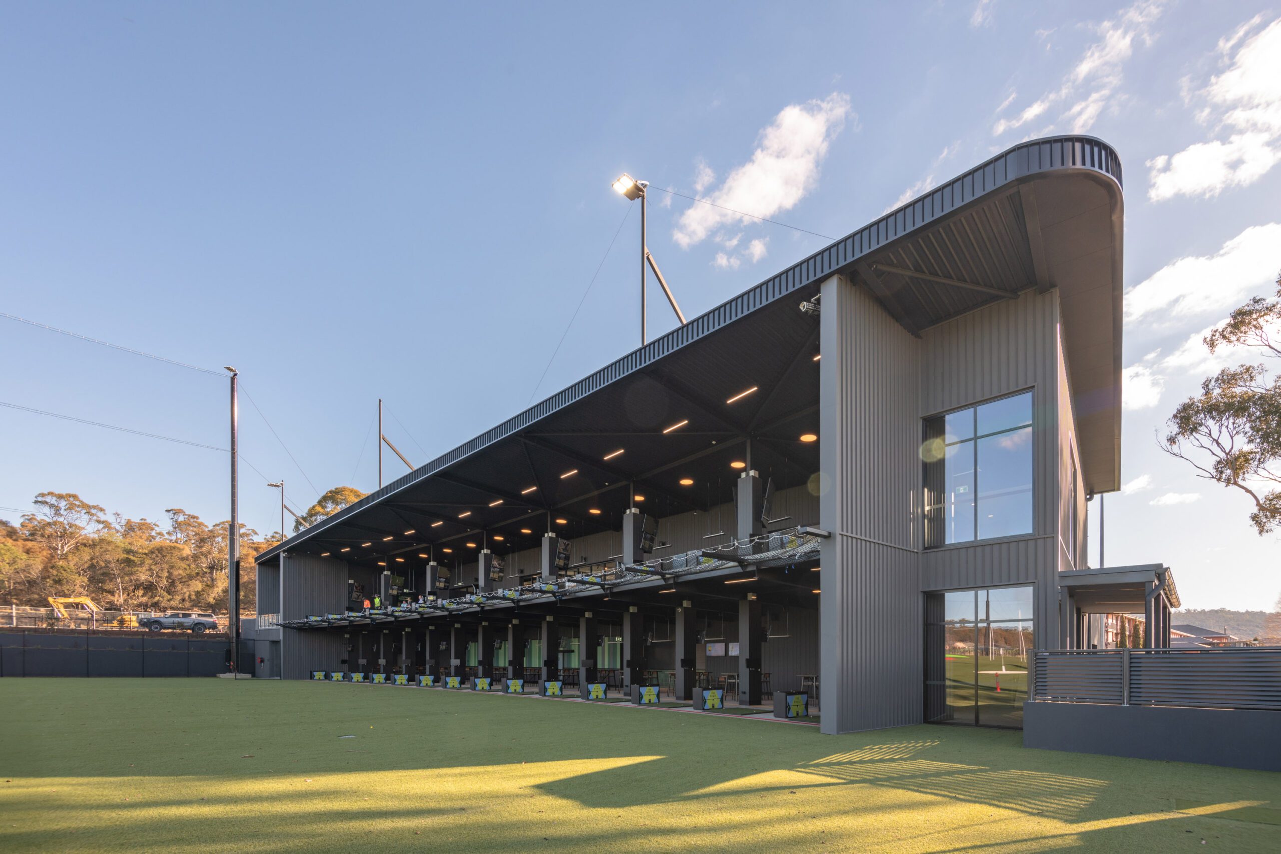 beardwood-photography-country_club-external-nda_2697s Learn how Degree C delivered the electrical, lighting, data, AV and smart building systems behind Tasmania's state-of-the-art Country Club Driving Range, creating a fully integrated entertainment venue.
